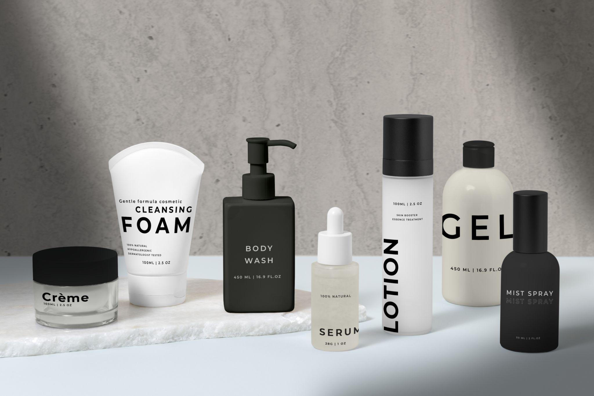 Premium cosmetic packaging -- skincare bottles, cream jars, and luxury paper boxes